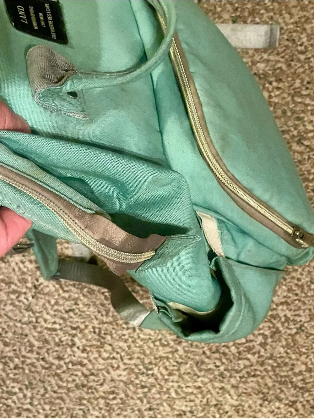 Mint Green Canvas Backpack with Top Handle and Front Pocket